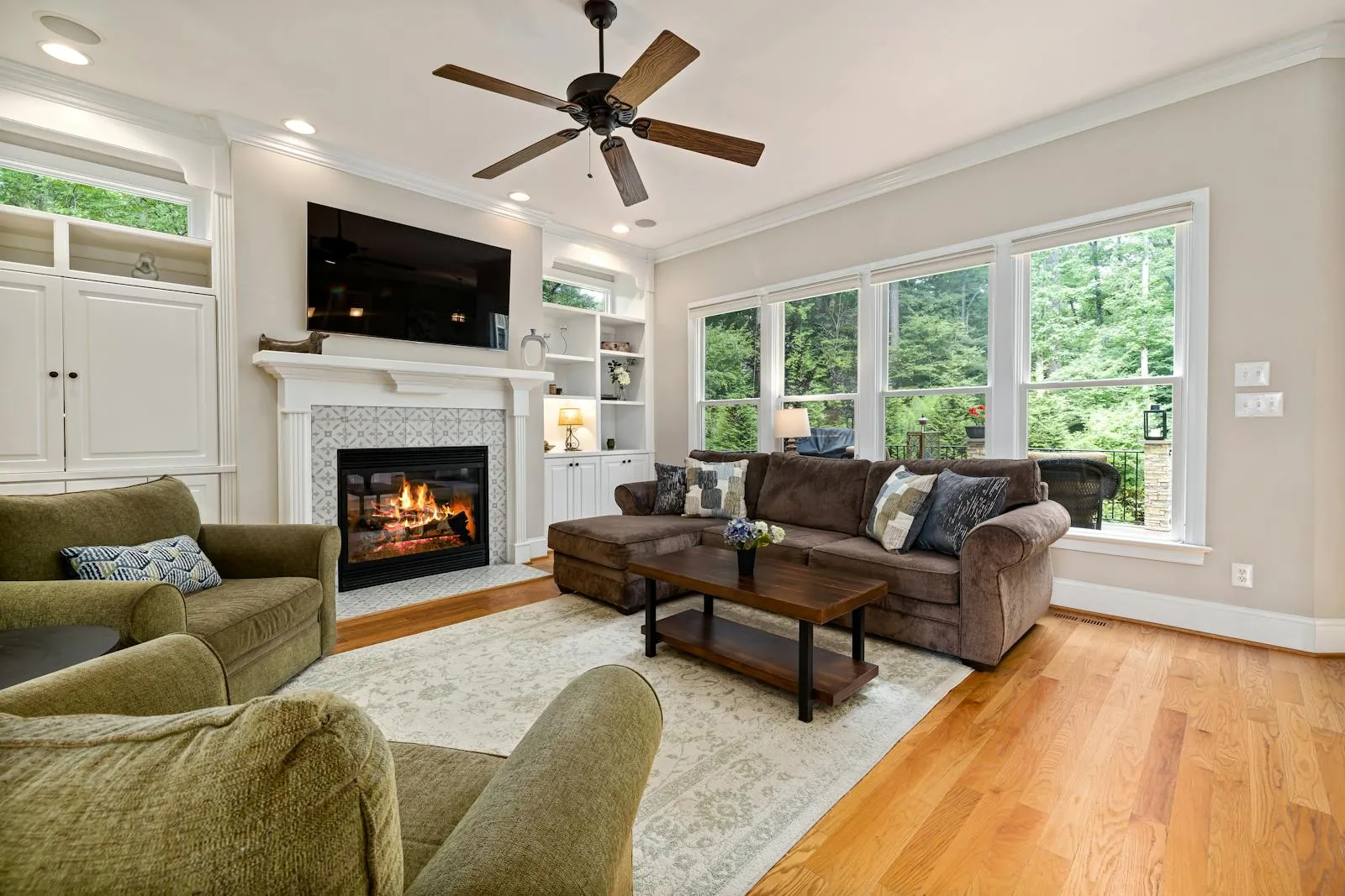 A warm, freshly cleaned living room in an East Metro home